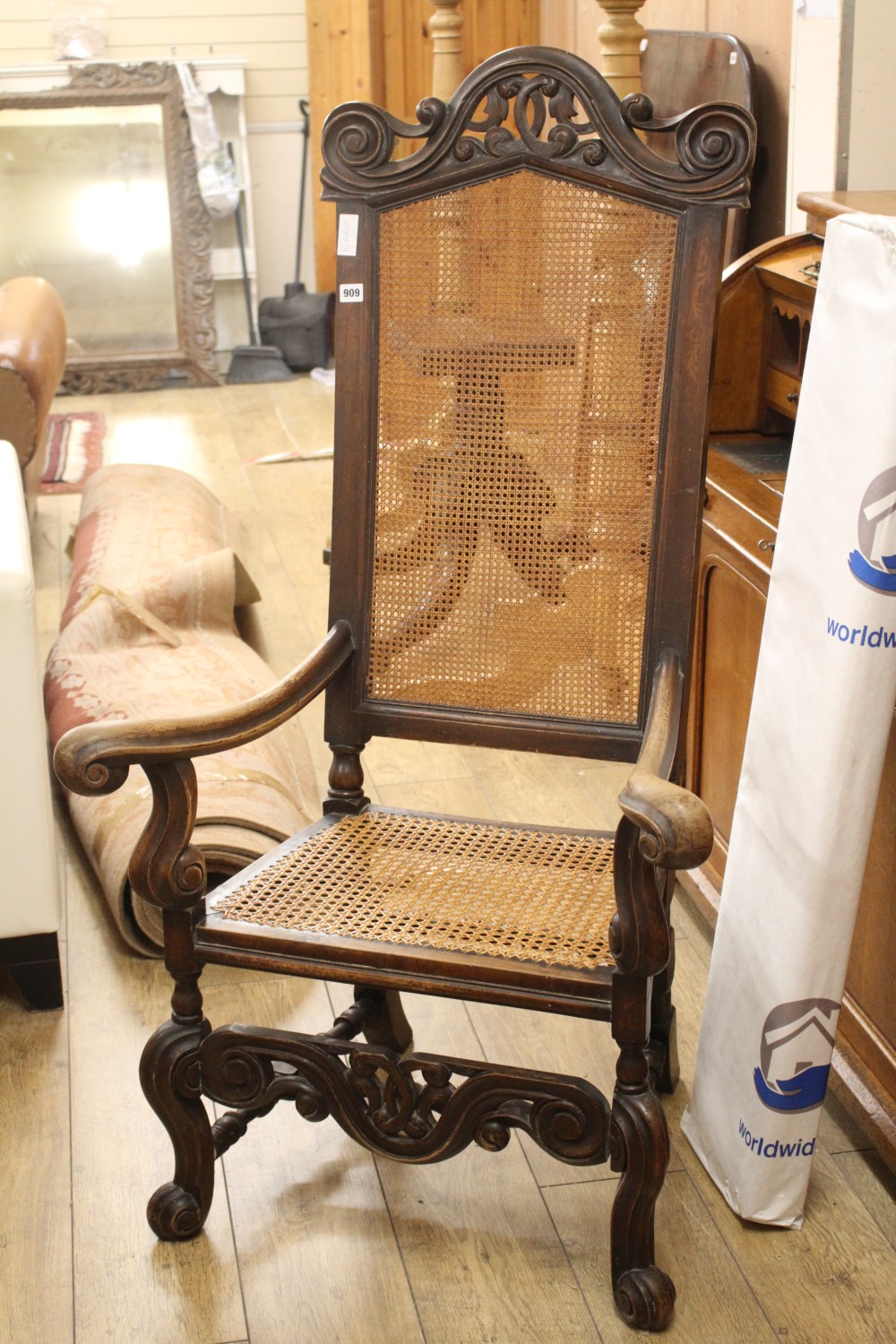 An 18th century style caned elbow chair, W.72cm D.60cm H.134cm